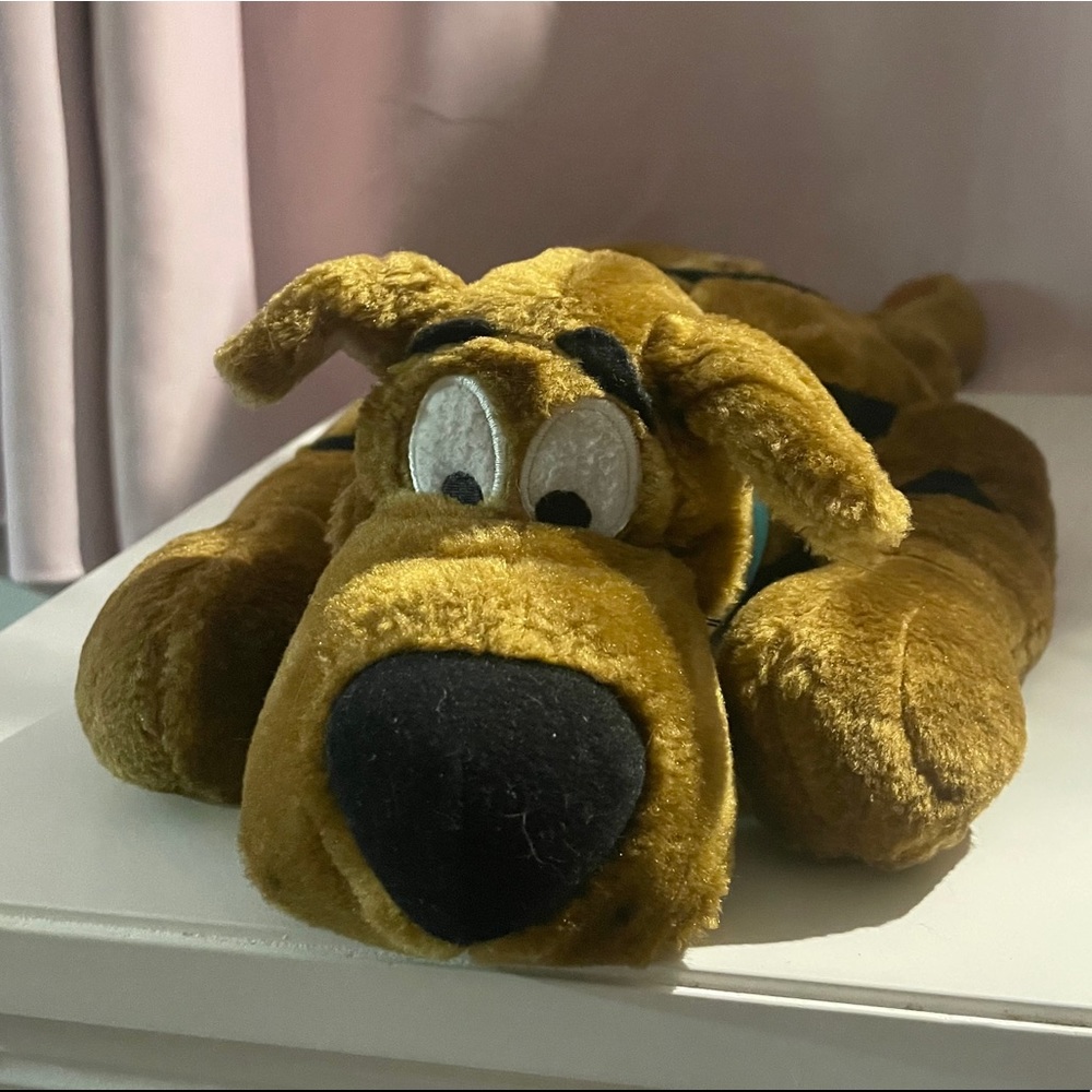 Flat-laying Scooby-Doo plush/pillow/stuffed animal